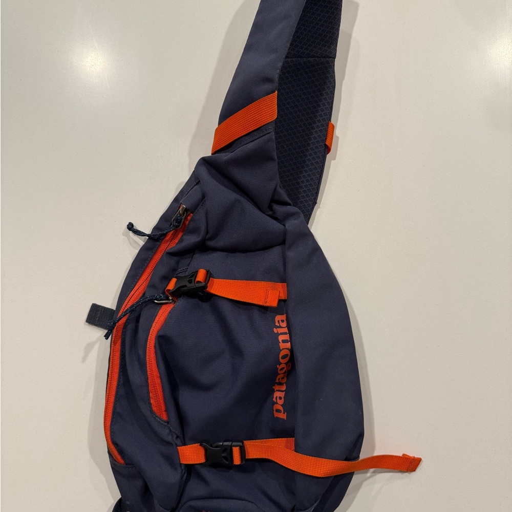 Patagonia Navy and Orange Atom 8L